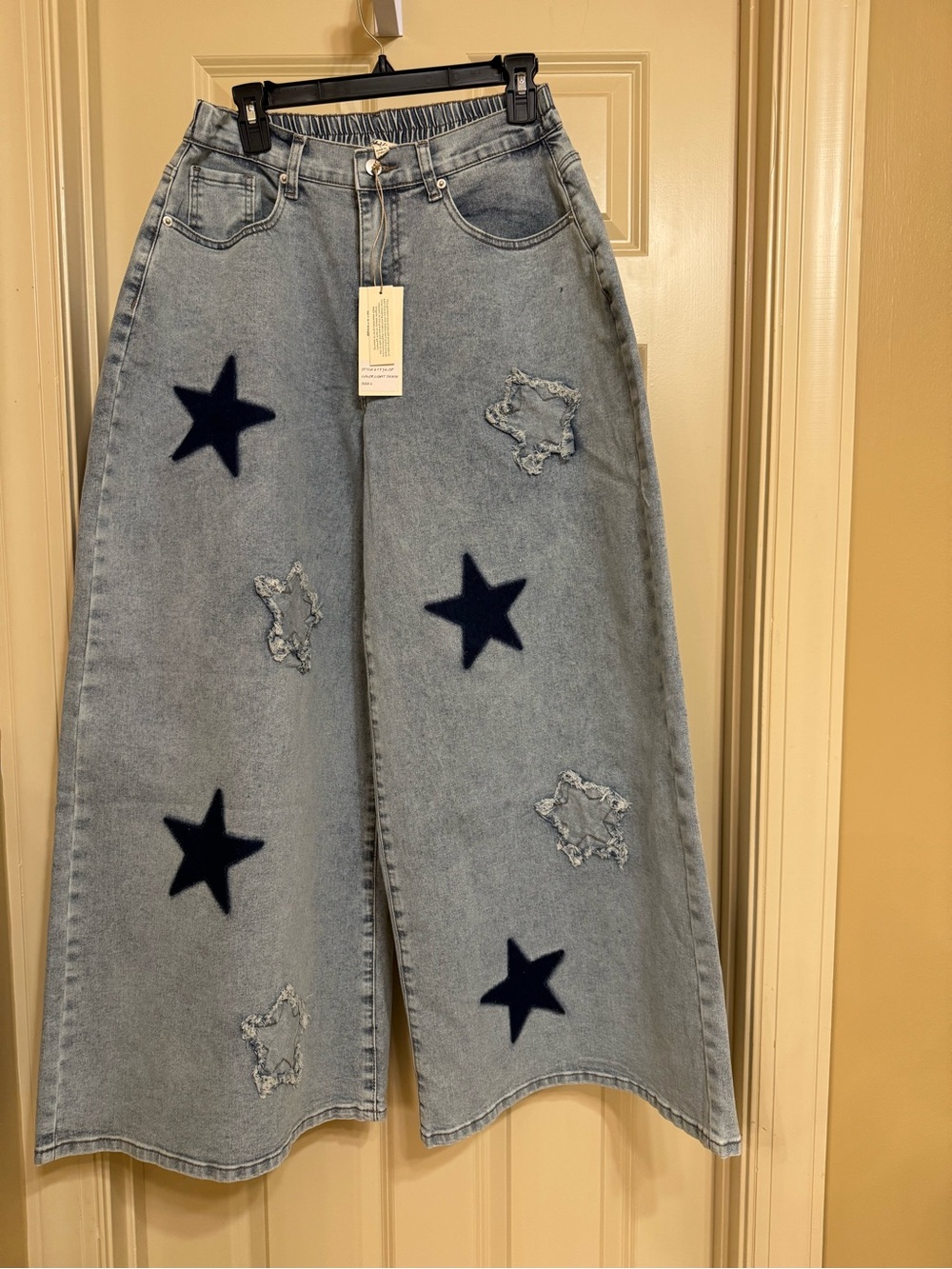 High-Rise Light Blue Wide-Leg Star Patch Jeans